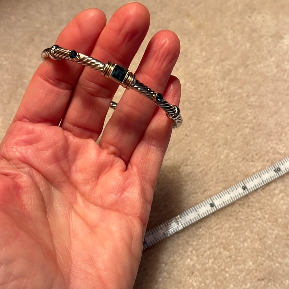 Silver tone costume bracelet w/blue insets